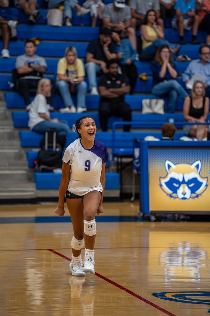 Arielle Akinwumi, number 9, celebrating a Richland point