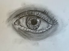 Hand-drawn eye by Arielle Akinwumi